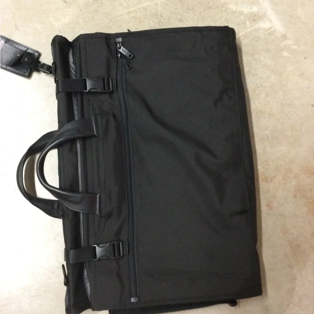Tumi Black Men's Travel Duffel with Front Zip Pocket and Carry Handles